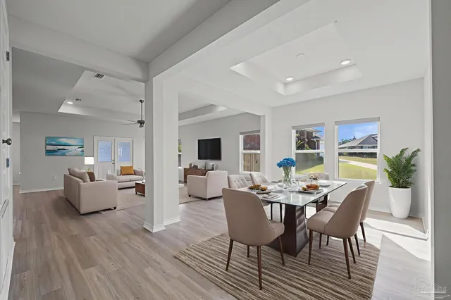 a view of kitchen with stainless steel appliances refrigerator oven and stove
