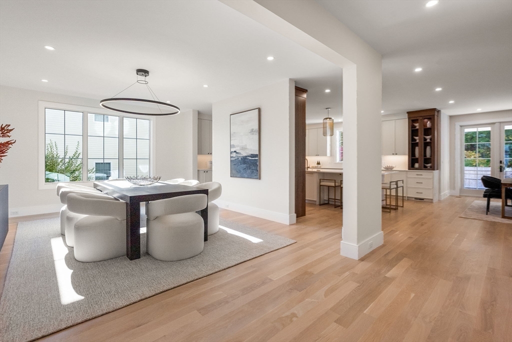 181 Wiswall Road Newton, MA 02459 - Photo 13 of 35 a dining room with furniture and wooden floor