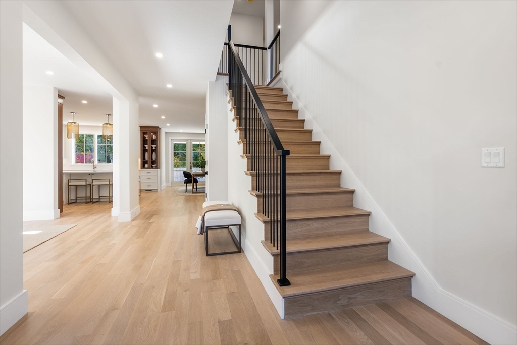 181 Wiswall Road Newton, MA 02459 - Photo 15 of 35 a view of entryway and hall with wooden floor