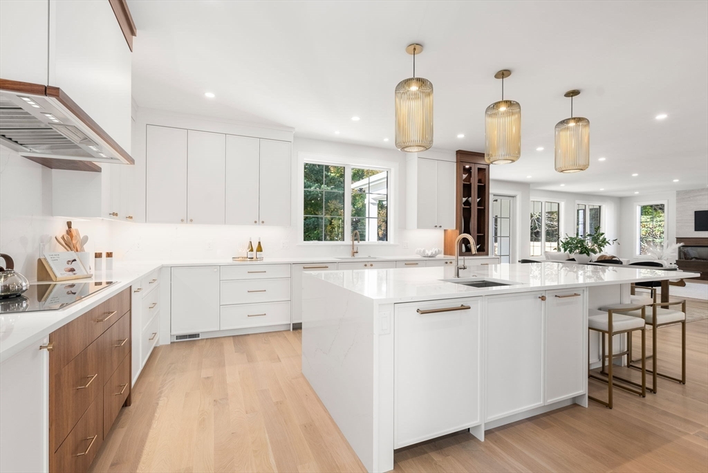 181 Wiswall Road Newton, MA 02459 - Photo 2 of 35 a kitchen with cabinets a sink and appliances