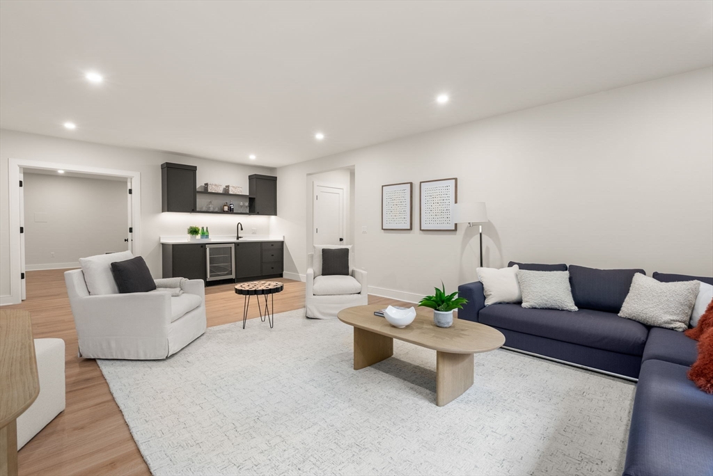 181 Wiswall Road Newton, MA 02459 - Photo 26 of 35 a living room with furniture and white walls