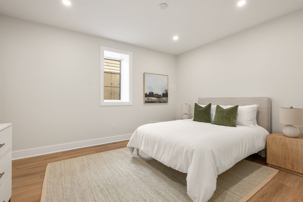 181 Wiswall Road Newton, MA 02459 - Photo 27 of 35 a bedroom with a bed and a window