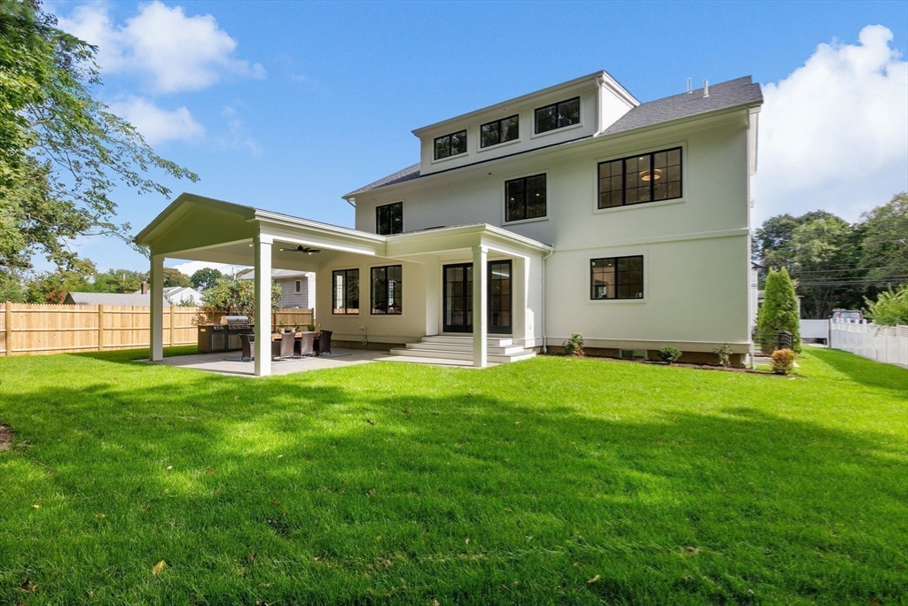 181 Wiswall Road Newton, MA 02459 - Photo 33 of 35 a front view of a house with a yard