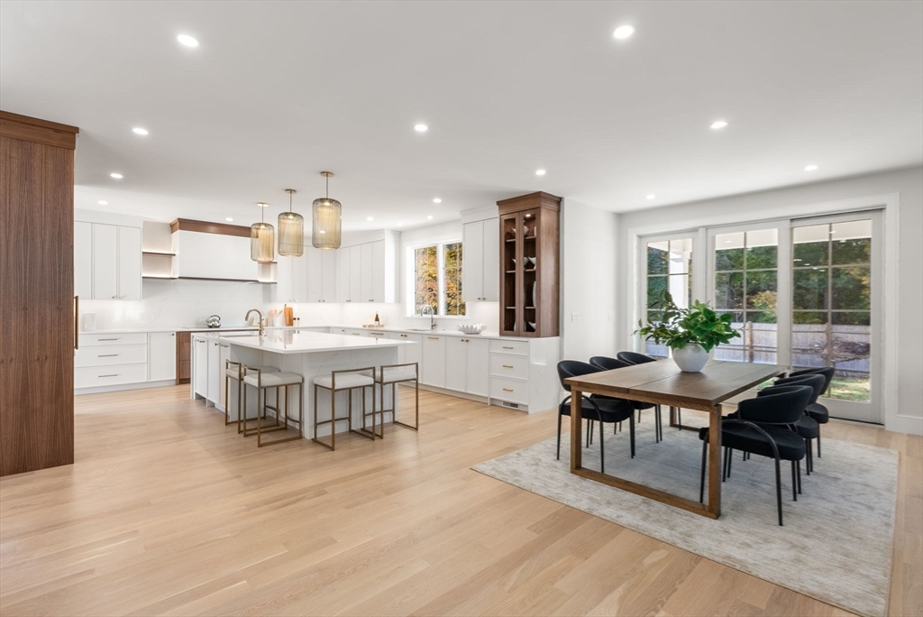 181 Wiswall Road Newton, MA 02459 - Photo 6 of 35 a view of a dining room with furniture and wooden floor
