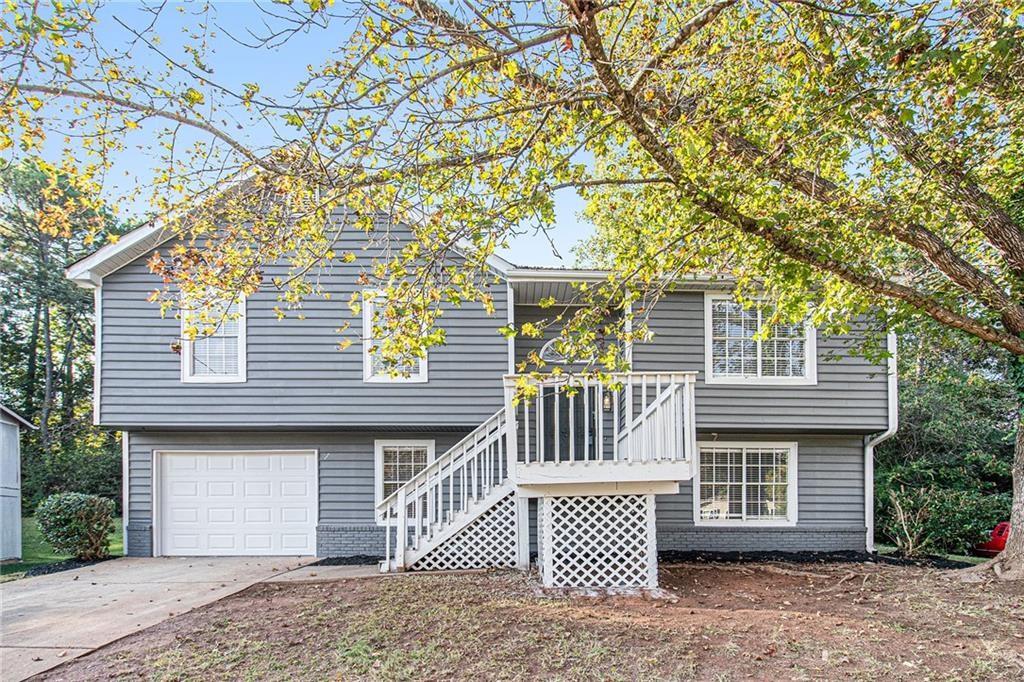 3490 Newberry Trail Decatur, GA 30034 - Photo 1 of 1 a front view of a house with a garage