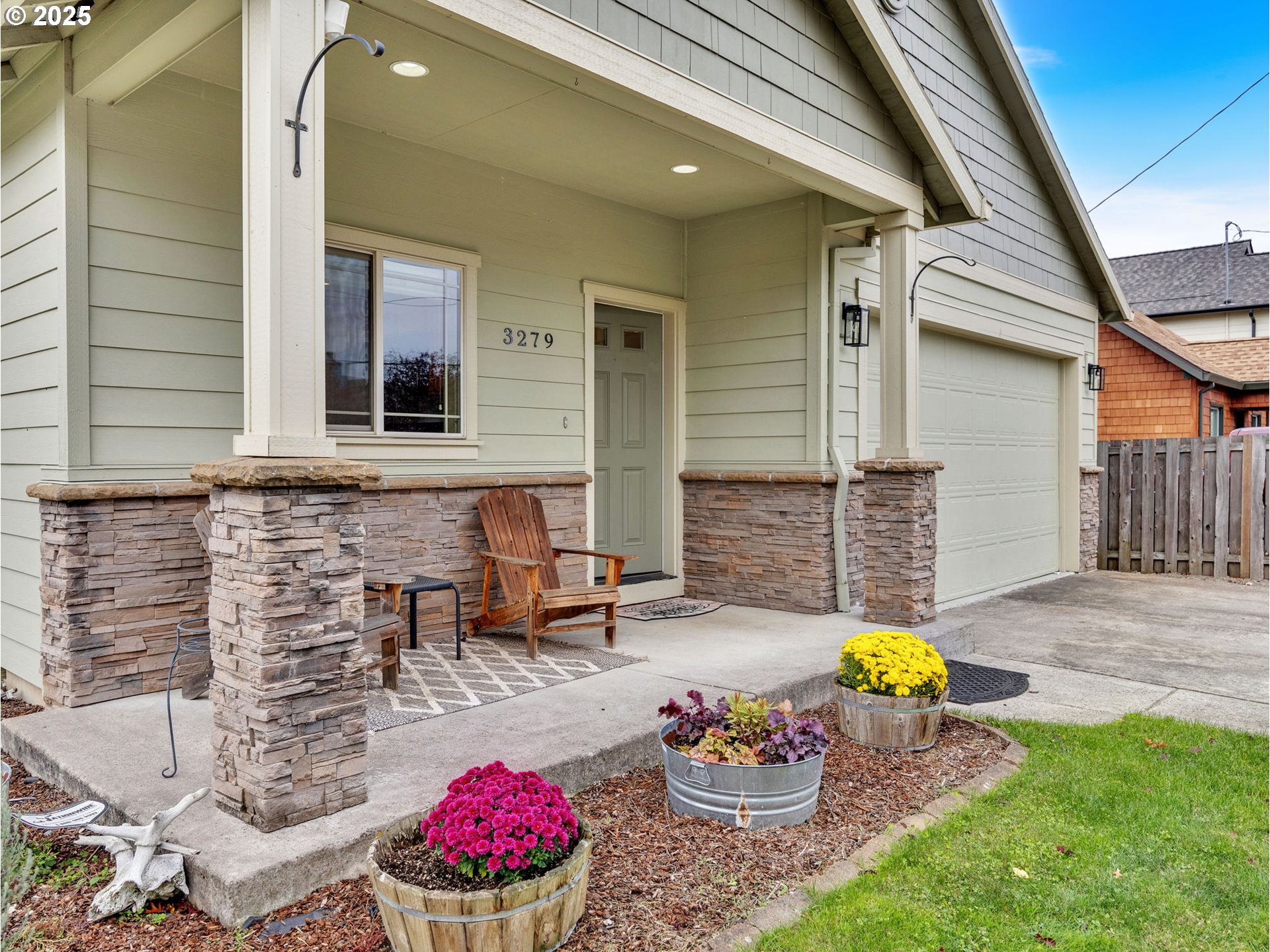 3279 Southeast Anderson Road Gresham, OR 97080 - Photo 2 of 42 a view of a patio with table and chairs and potted plants