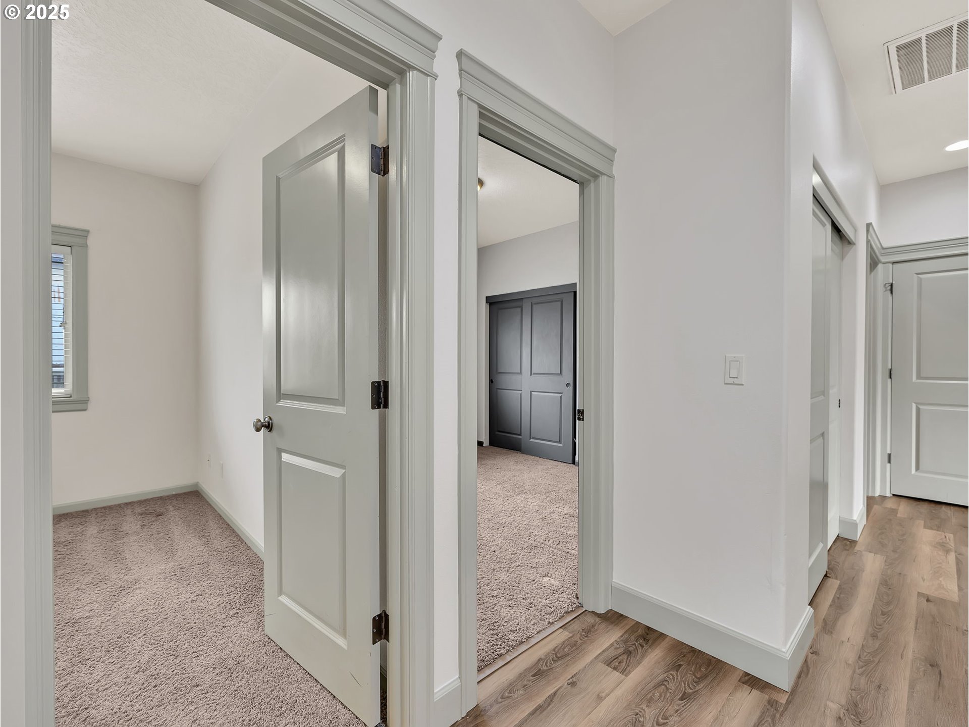 3279 Southeast Anderson Road Gresham, OR 97080 - Photo 23 of 42 a view of a hallway with wooden floor