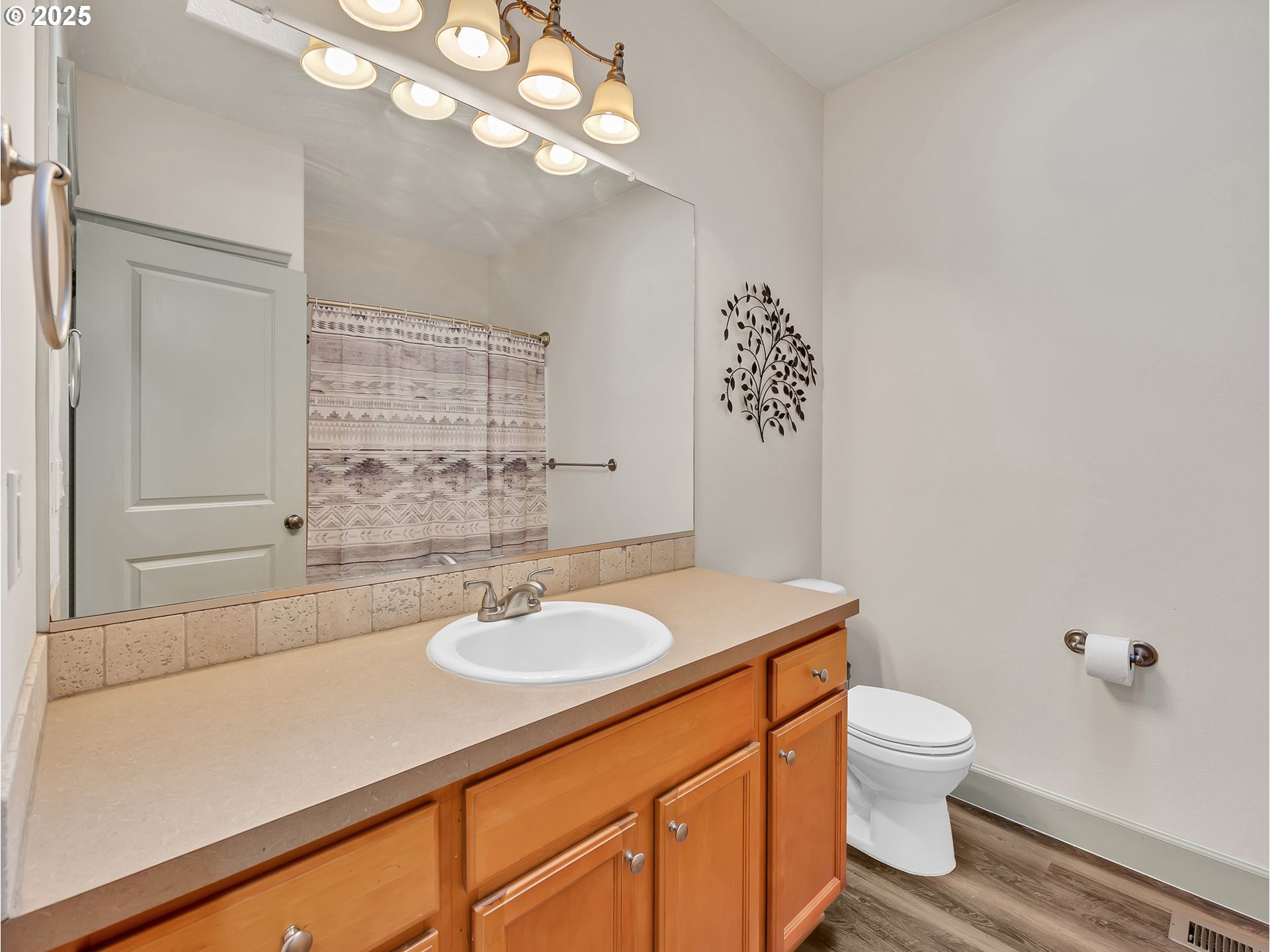 3279 Southeast Anderson Road Gresham, OR 97080 - Photo 28 of 42 a bathroom with a sink a toilet and a mirror