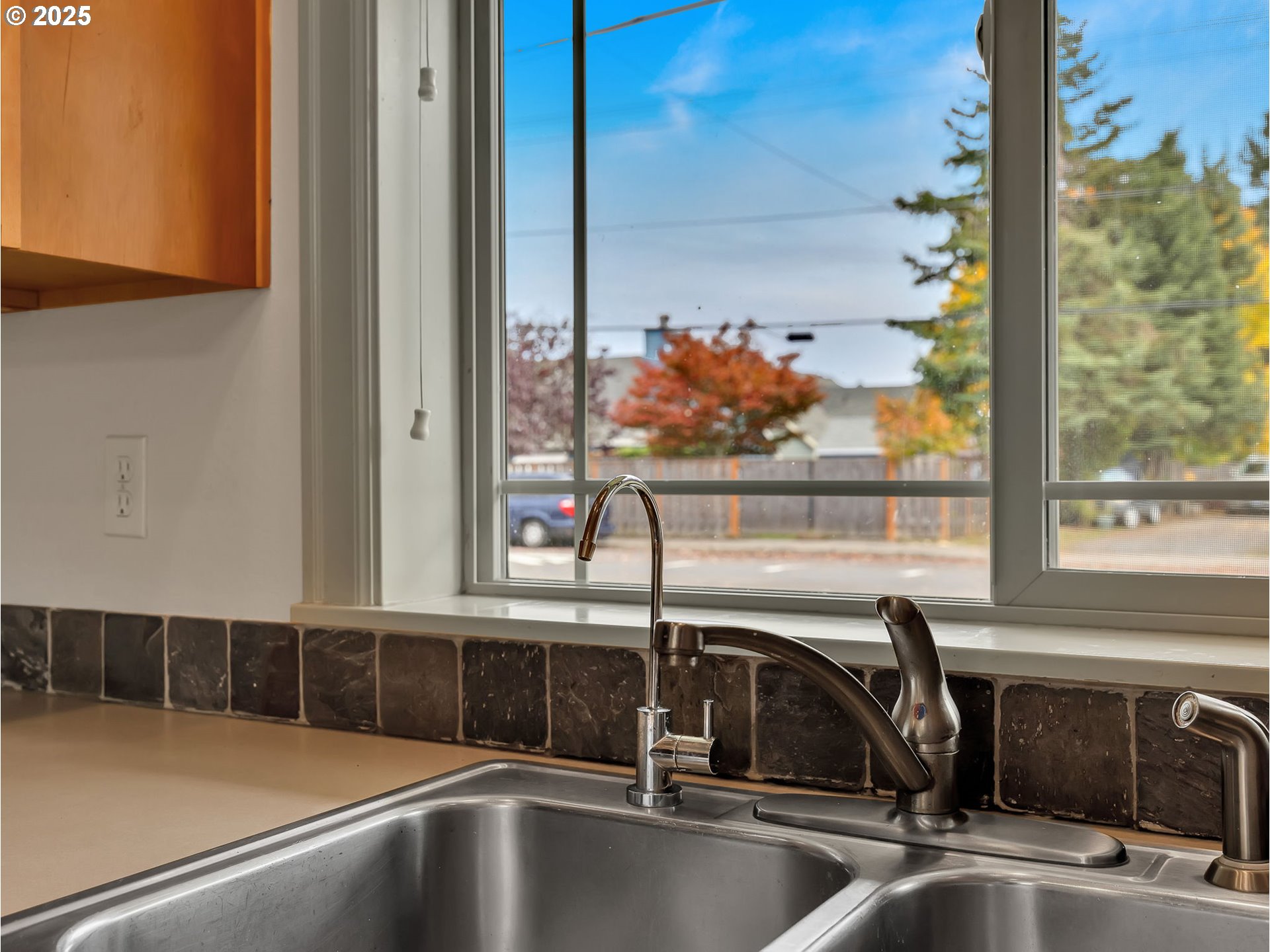 3279 Southeast Anderson Road Gresham, OR 97080 - Photo 10 of 42 a kitchen sink with a cabinet and mirror