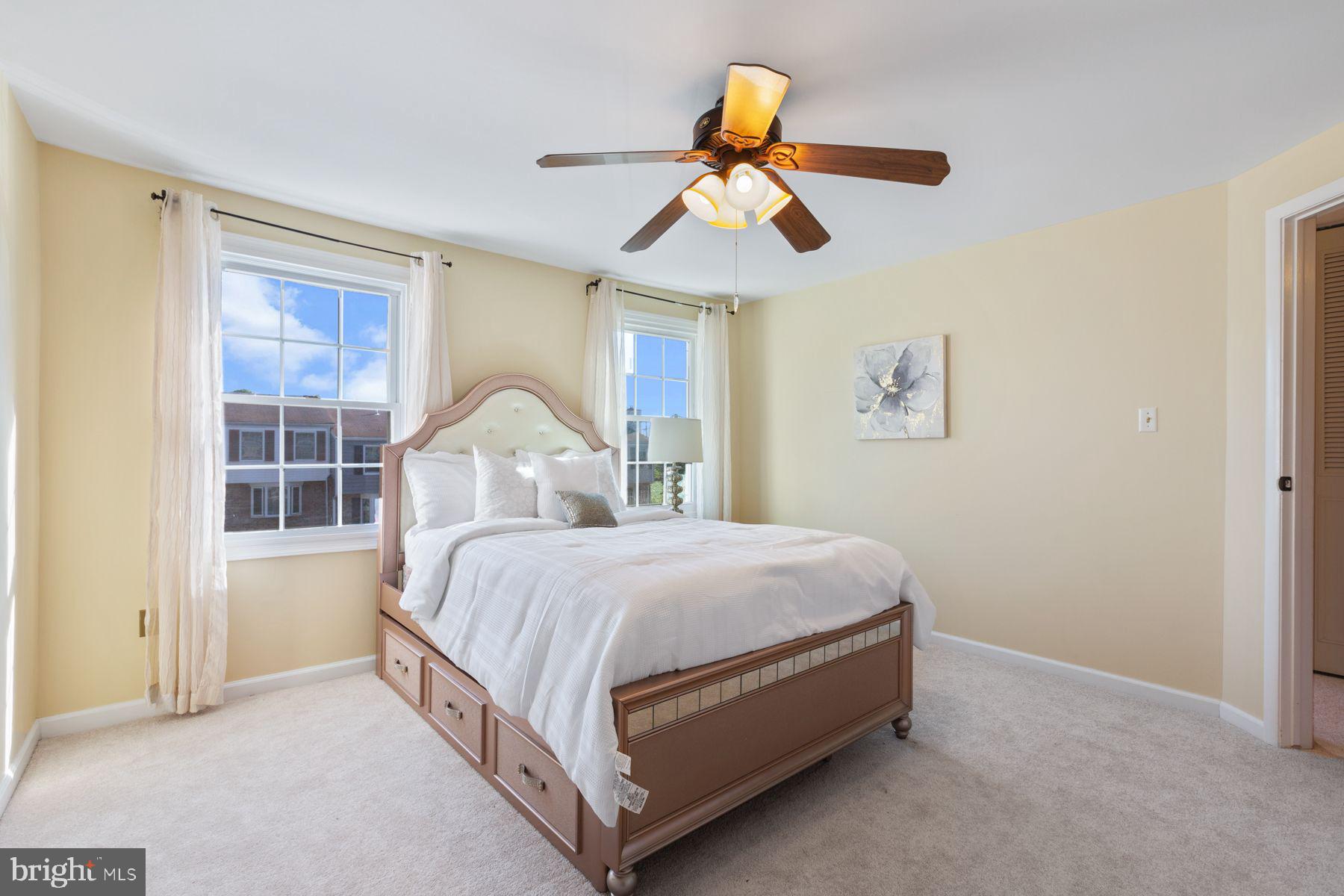 17660 Kohlhoss Road Poolesville, MD 20837 - Photo 12 of 22 a bedroom with a bed and window