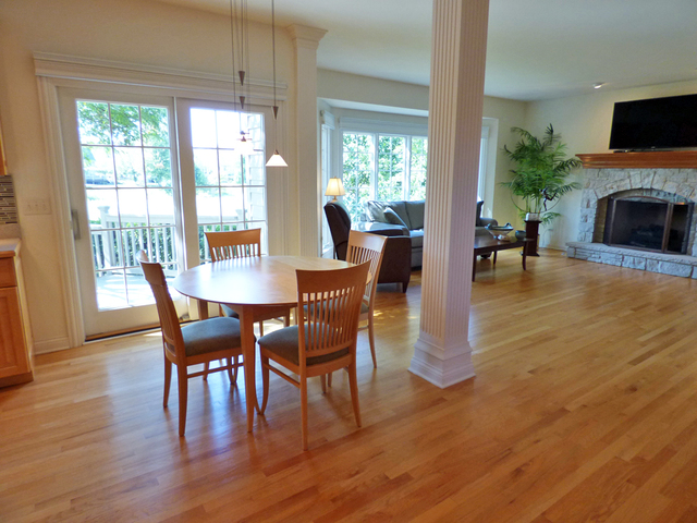 S130 Forbes Drive Geneva, IL 60134 - Photo 14 of 45 a dining room with furniture mountain view and a fireplace
