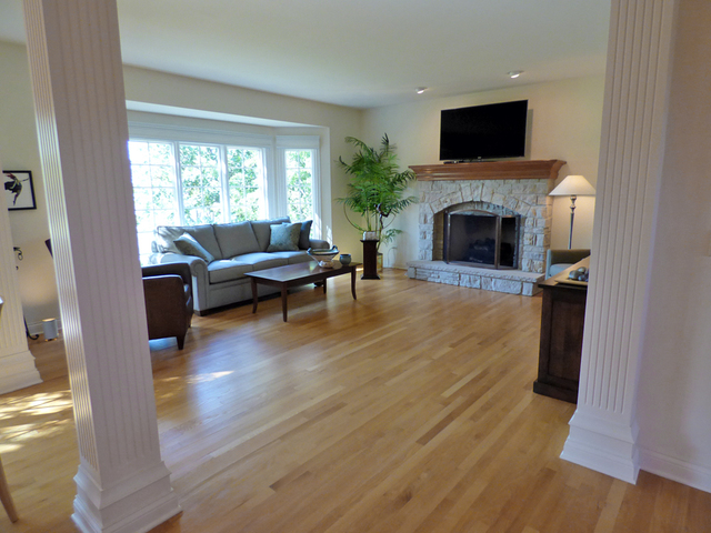 S130 Forbes Drive Geneva, IL 60134 - Photo 15 of 45 a living room with furniture a flat screen tv and a fireplace
