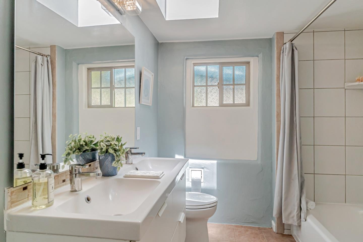 361 Moosehead Drive Aptos, CA 95003 - Photo 23 of 37 a bathroom with a sink toilet and shower