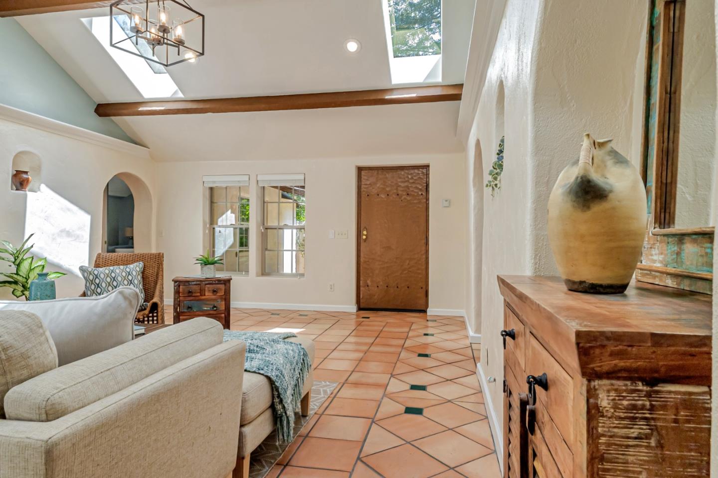 361 Moosehead Drive Aptos, CA 95003 - Photo 8 of 37 a living room with furniture and a chandelier