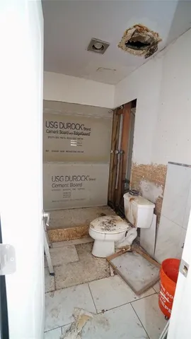 a view of living room with furniture and rug