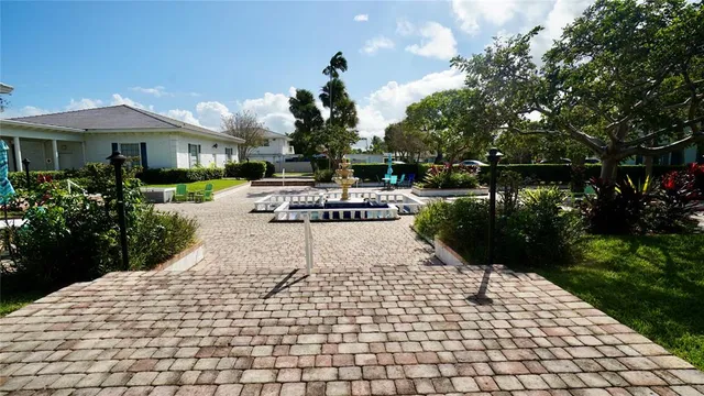 a view of a chairs and tables in the patio