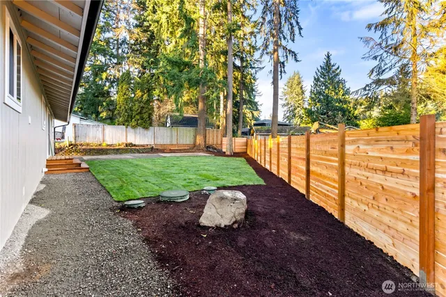 a view of a yard with an outdoor space