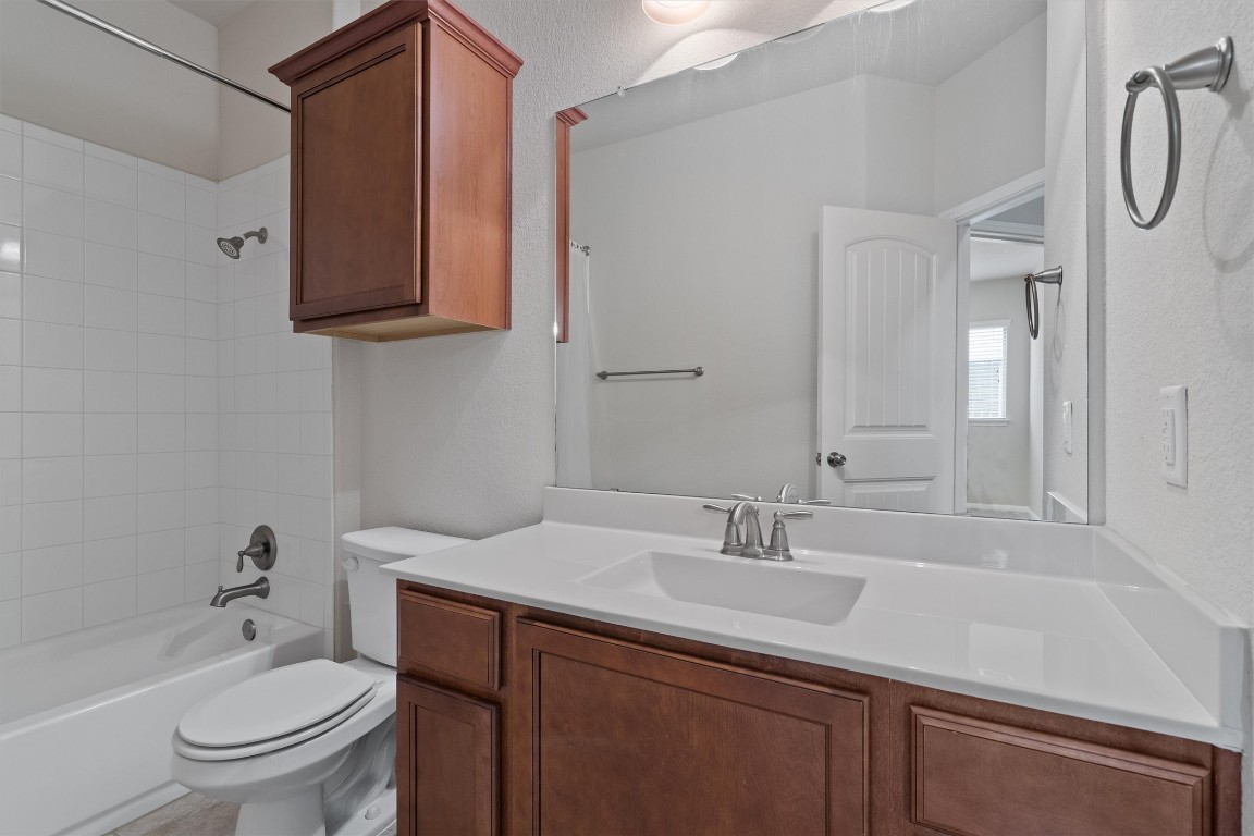 533 Jess Maynard Trail Leander, TX 78641 - Photo 15 of 24 Bathroom featuring vanity and shower / bath combination