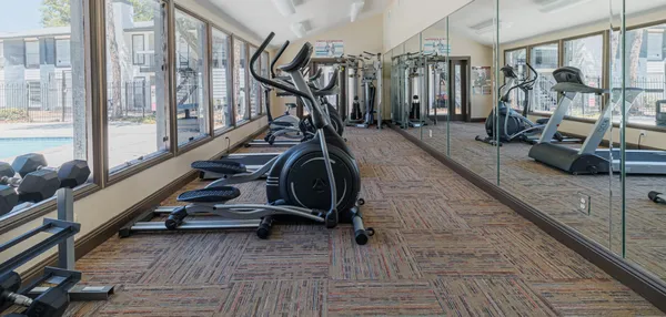 a view of a room with gym equipment