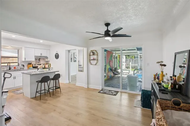a view of a living room and dining room