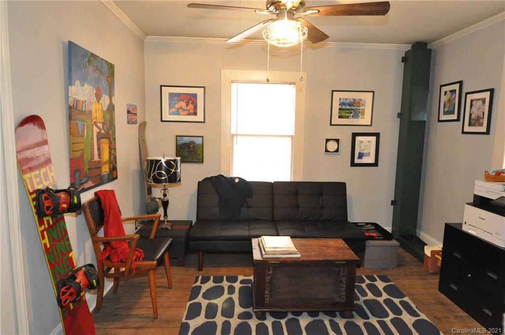 106 Nella Street Chester, SC 29706 - Photo 2 of 13 a living room with furniture a rug and a window