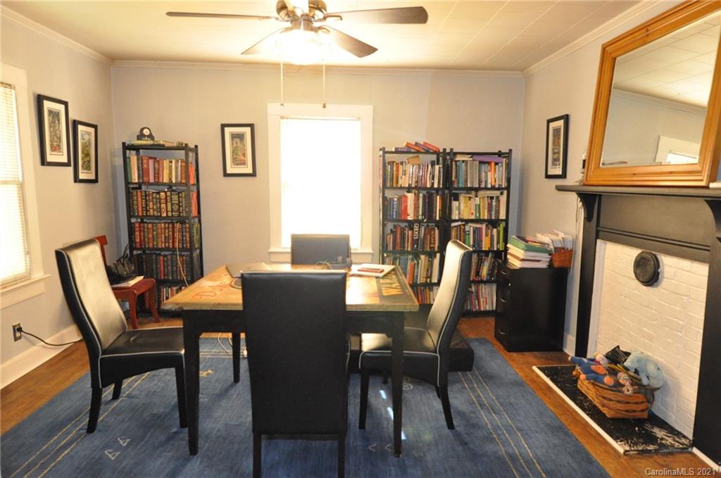 106 Nella Street Chester, SC 29706 - Photo 3 of 13 a view of a dining room with furniture window and wooden floor