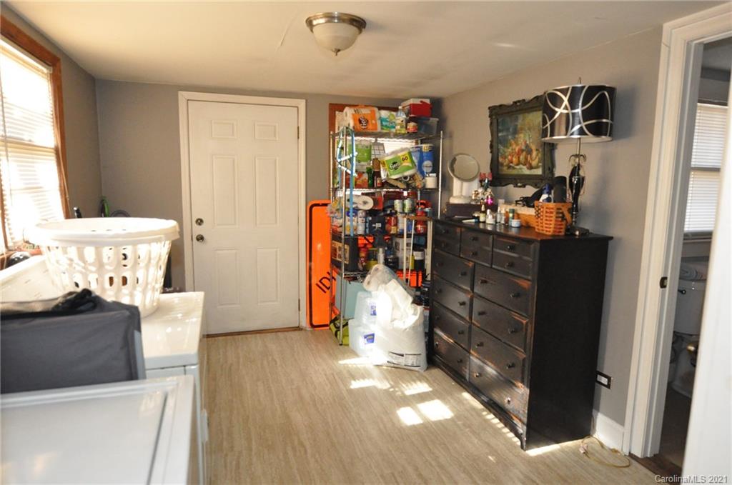 106 Nella Street Chester, SC 29706 - Photo 7 of 13 a view of a livingroom with furniture and storage