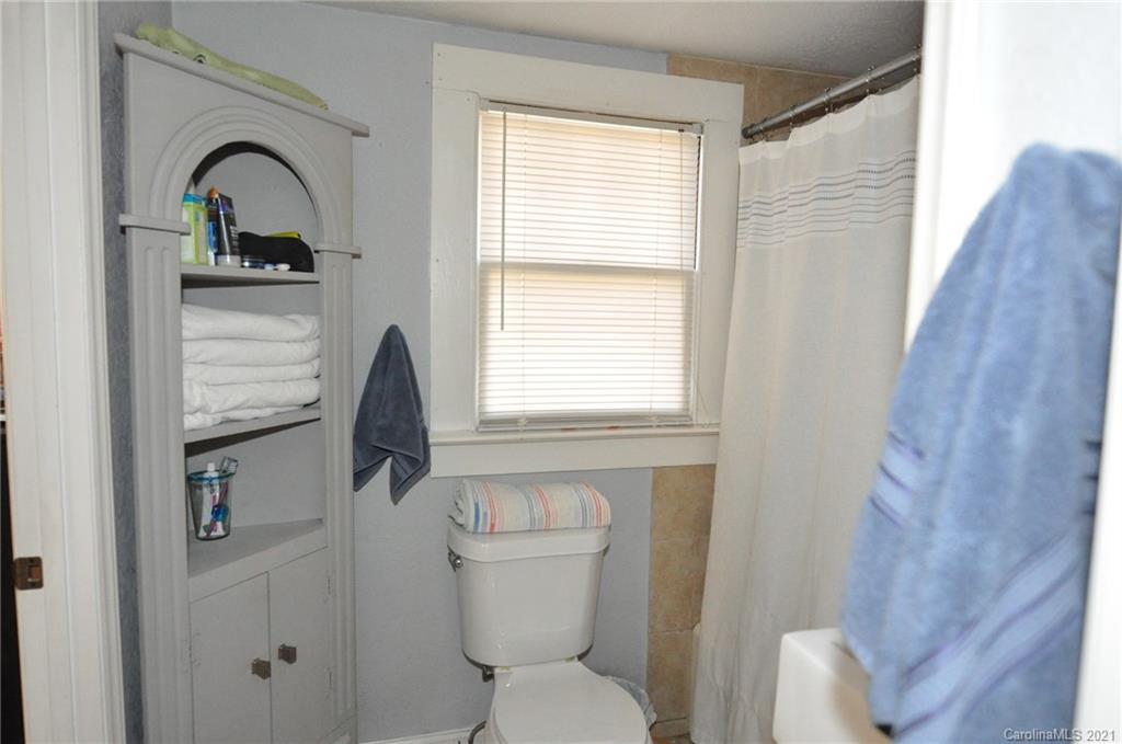 106 Nella Street Chester, SC 29706 - Photo 9 of 13 a bathroom with a toilet sink and tub