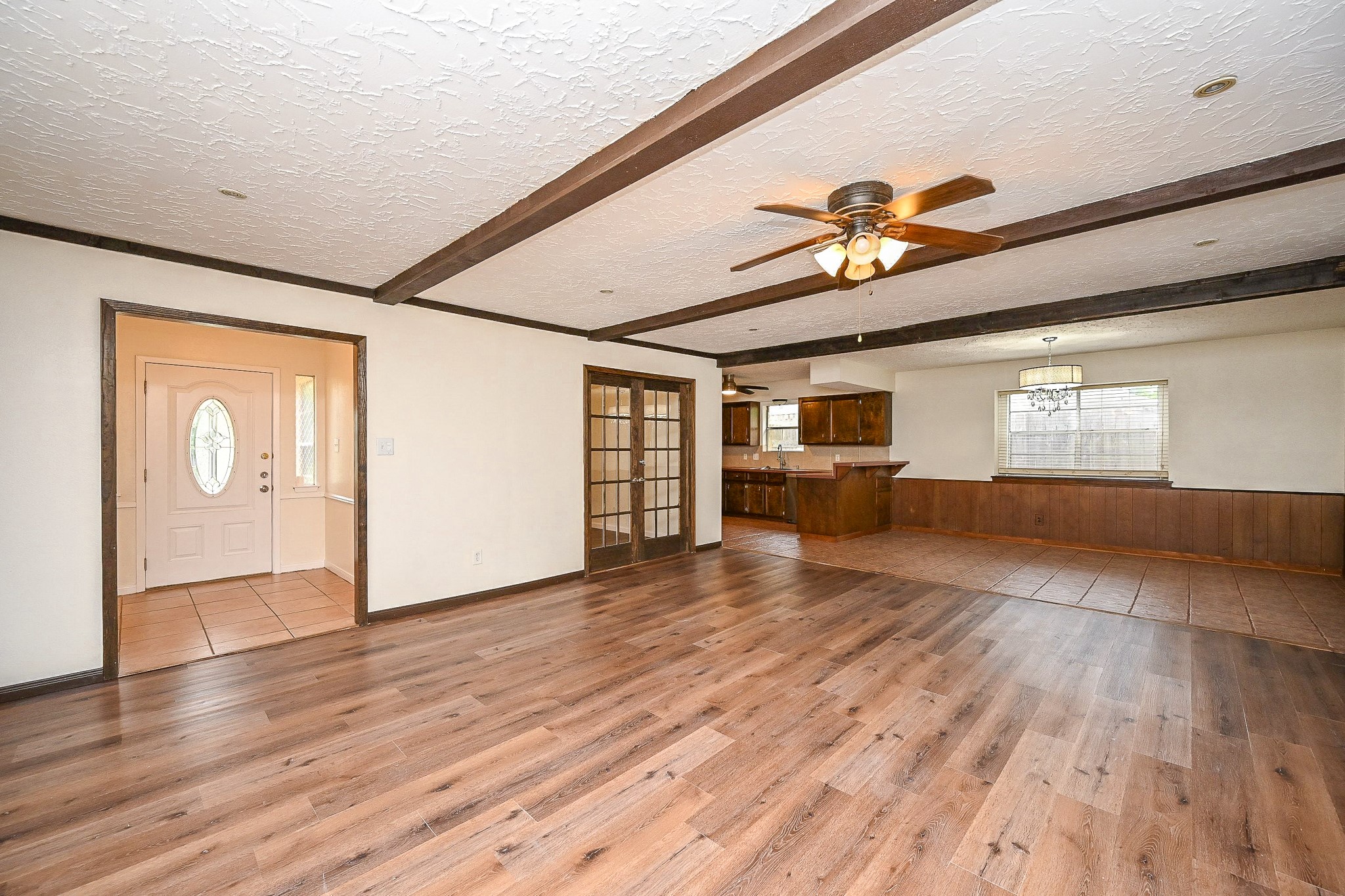 23814 Spring Gum Drive Spring, TX 77373 - Photo 8 of 21 a view of empty room with wooden floor