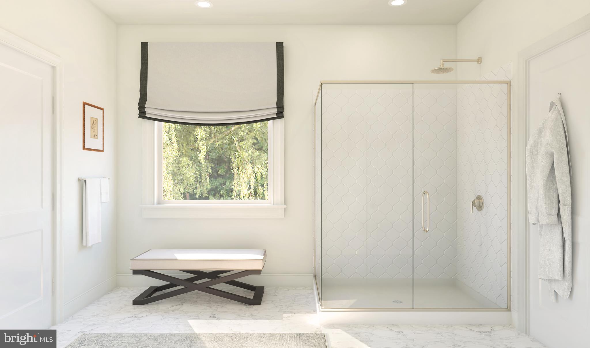 883 Merlin Drive Middletown, DE 19709 - Photo 15 of 16 a bathroom with a shower and a window