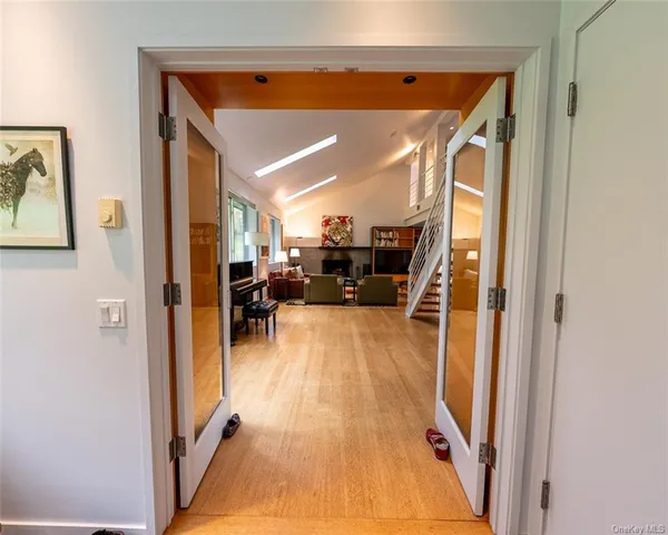 a view of a living room with a wooden floor