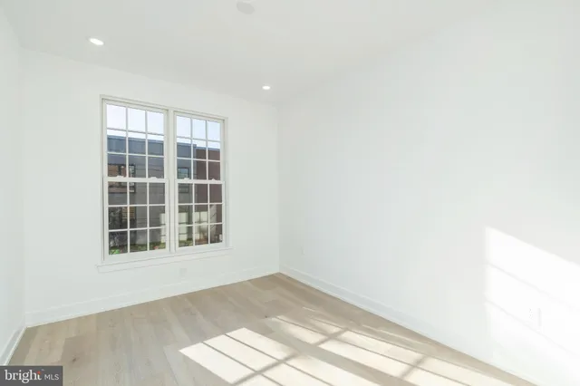 a view of empty room with windows