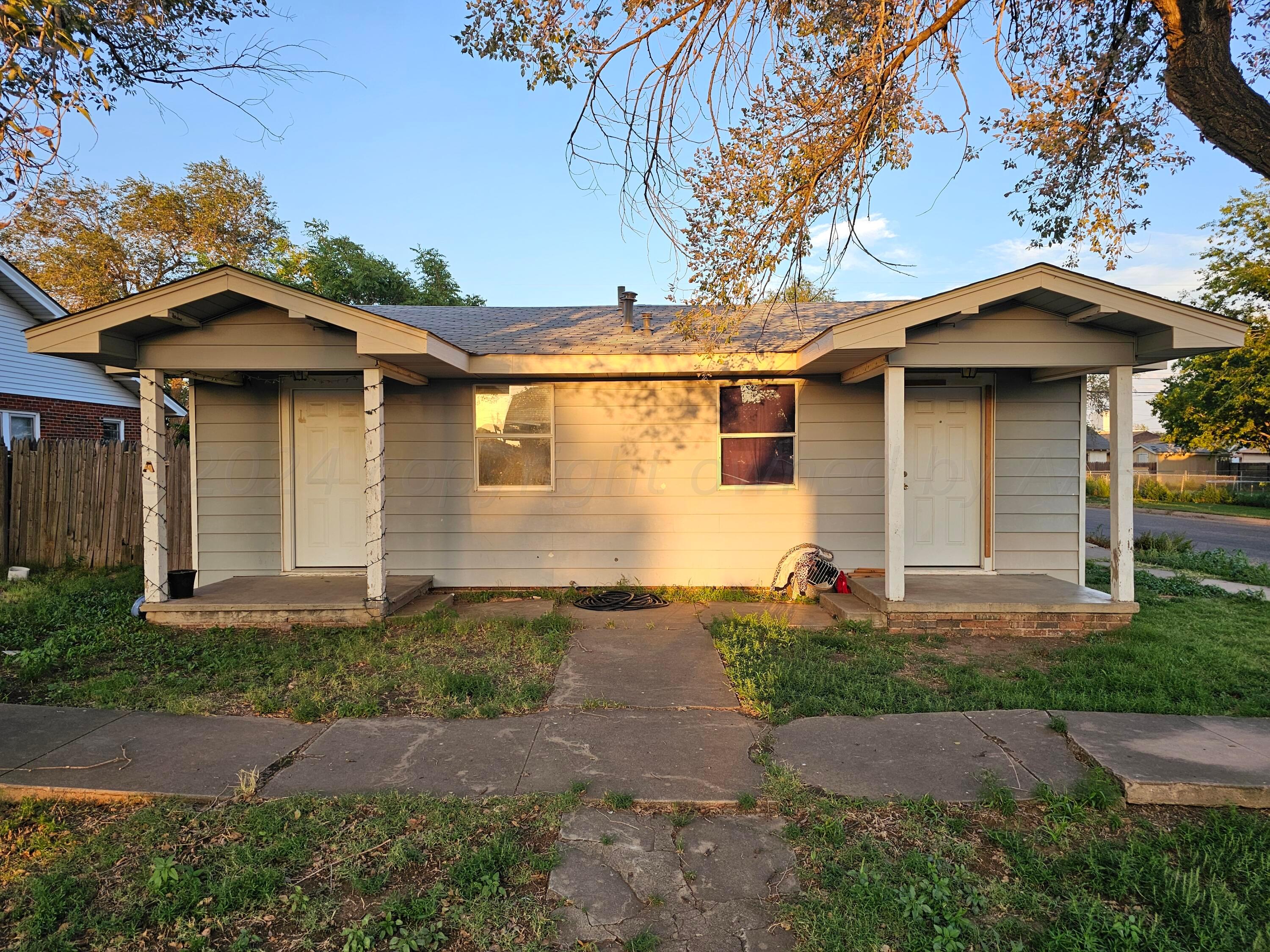 411 South Florida Street Amarillo, TX 79106 - Photo 2 of 2 a front view of a house with garden