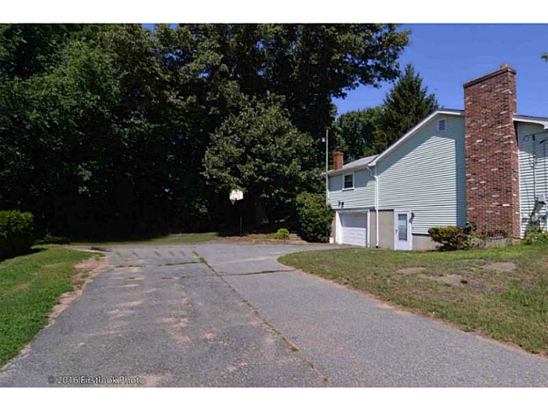 104 Curran Road Cumberland, RI 02864 - Photo 3 of 25 Exterior Front.