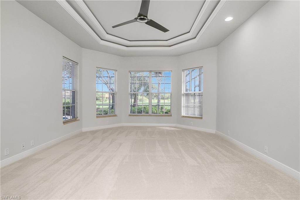 10160 Ginger Pointe Court Estero, FL 34135 - Photo 21 of 37 wooden floor in an empty room with a window