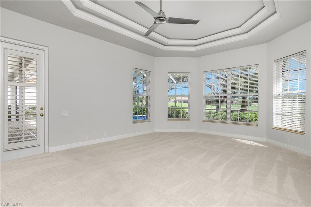 10160 Ginger Pointe Court Estero, FL 34135 - Photo 22 of 37 a view of an empty room with a window