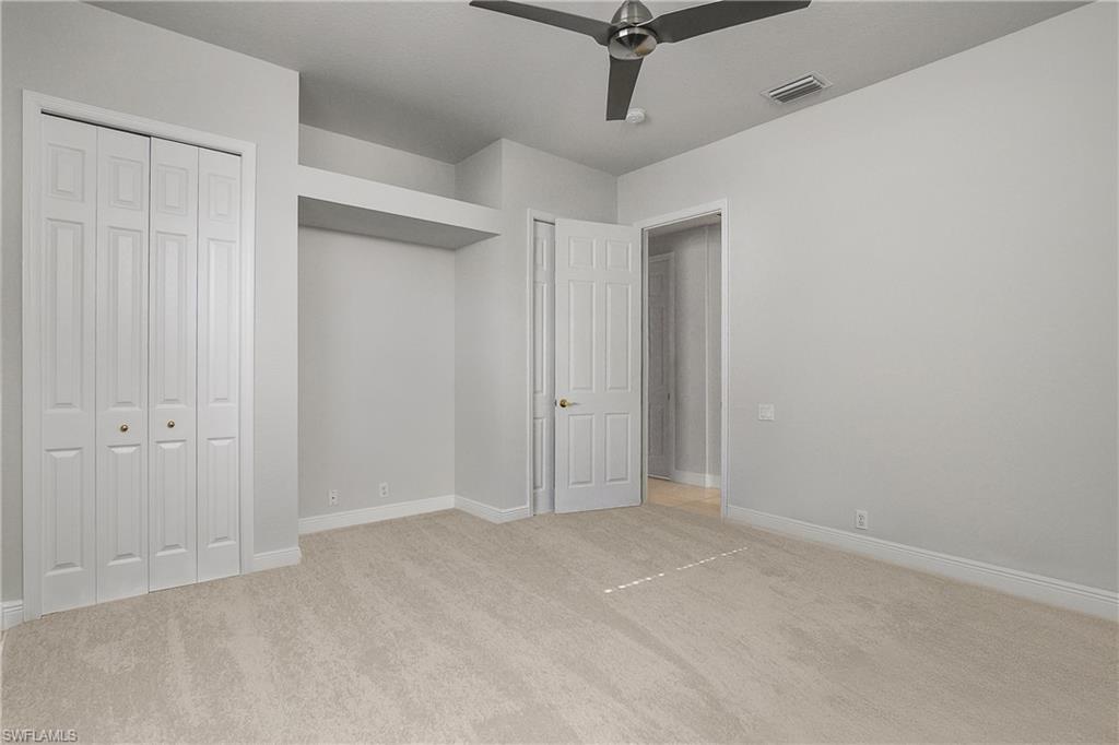 10160 Ginger Pointe Court Estero, FL 34135 - Photo 27 of 37 a view of an empty room