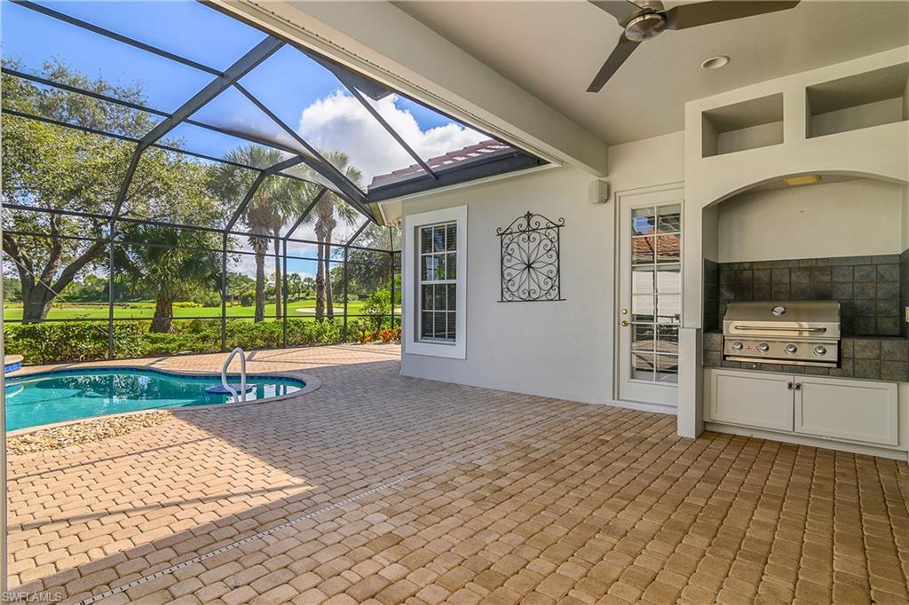 10160 Ginger Pointe Court Estero, FL 34135 - Photo 30 of 37 a view of a porch with a backyard