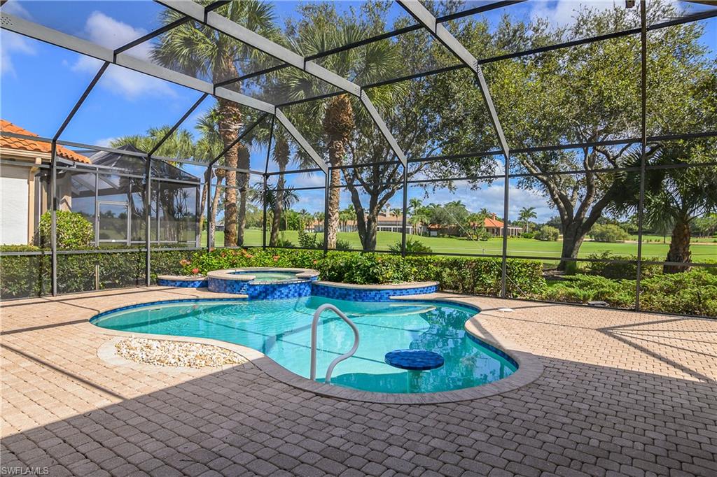 10160 Ginger Pointe Court Estero, FL 34135 - Photo 33 of 37 a view of a backyard with swimming pool