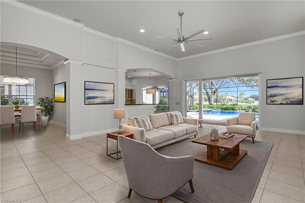 10160 Ginger Pointe Court Estero, FL 34135 - Photo 5 of 37 a living room with furniture and a large window
