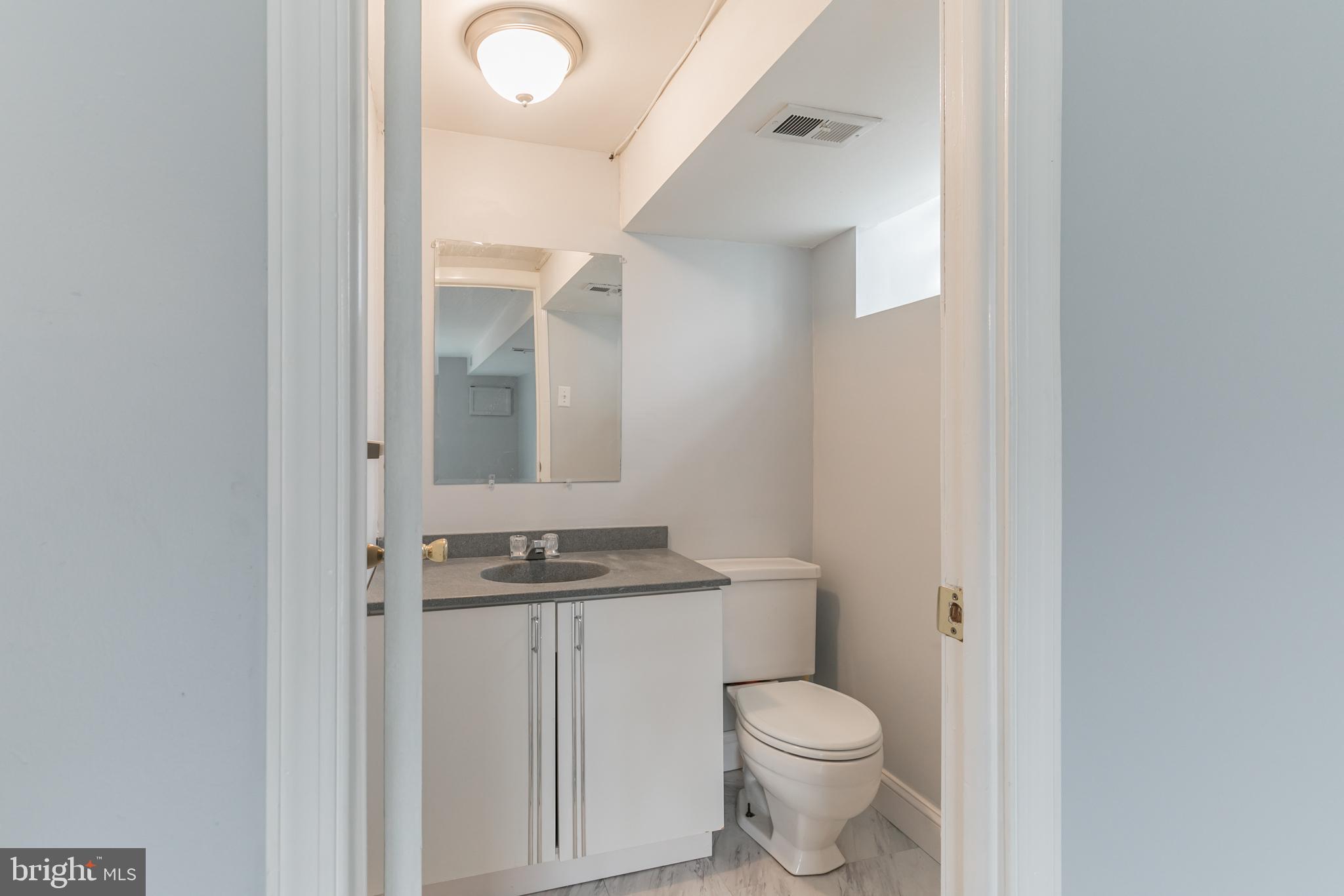 1821 Tomlinson Road Philadelphia, PA 19116 - Photo 28 of 35 Family Room Powder Room