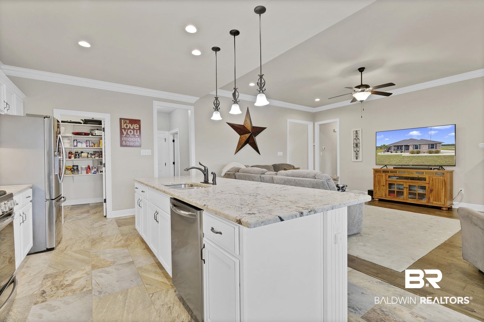 11247 Thistledown Loop Spanish Fort, AL 36527 - Photo 71 of 72 Kitchen with stainless steel appliances, open floor plan, a sink, and ornamental molding