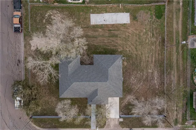 an aerial view of residential house with outdoor space