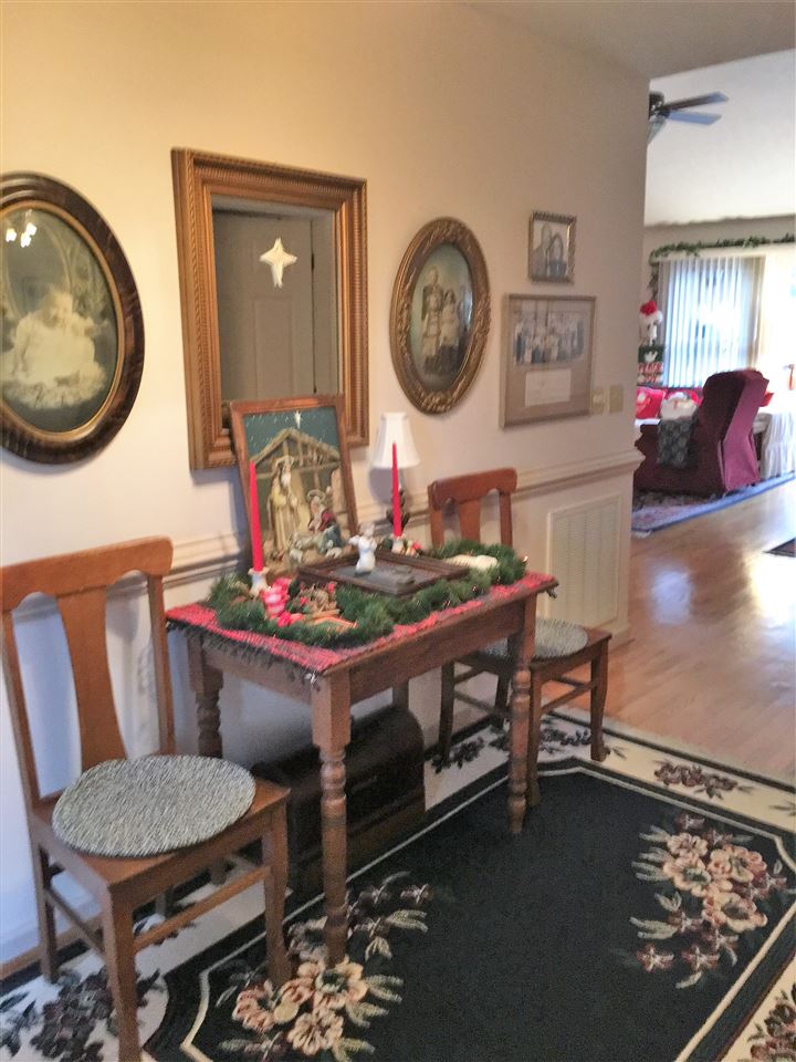 96 Swoope Road Swoope, VA 24479 - Photo 13 of 27 a living room with furniture a clock and a large mirror