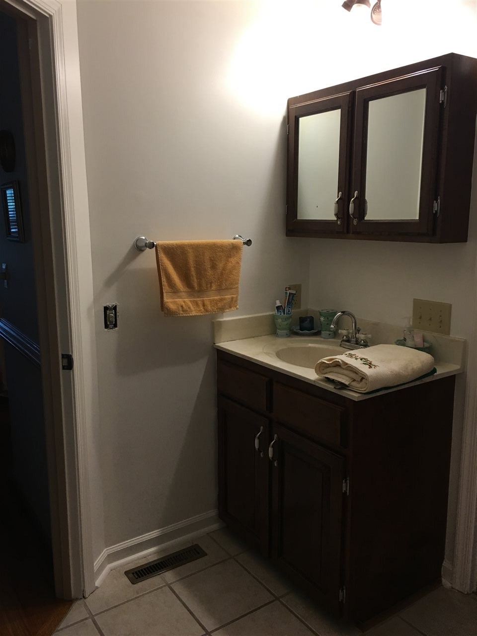 96 Swoope Road Swoope, VA 24479 - Photo 26 of 27 a bathroom with a sink and a mirror