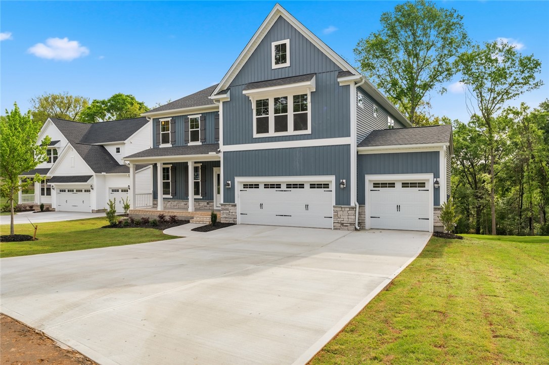 1108 Manse Jolly Road Anderson, SC 29621 - Photo 2 of 45 This newly constructed home boasts charming curb appeal and a spacious driveway leading to multiple garages.
