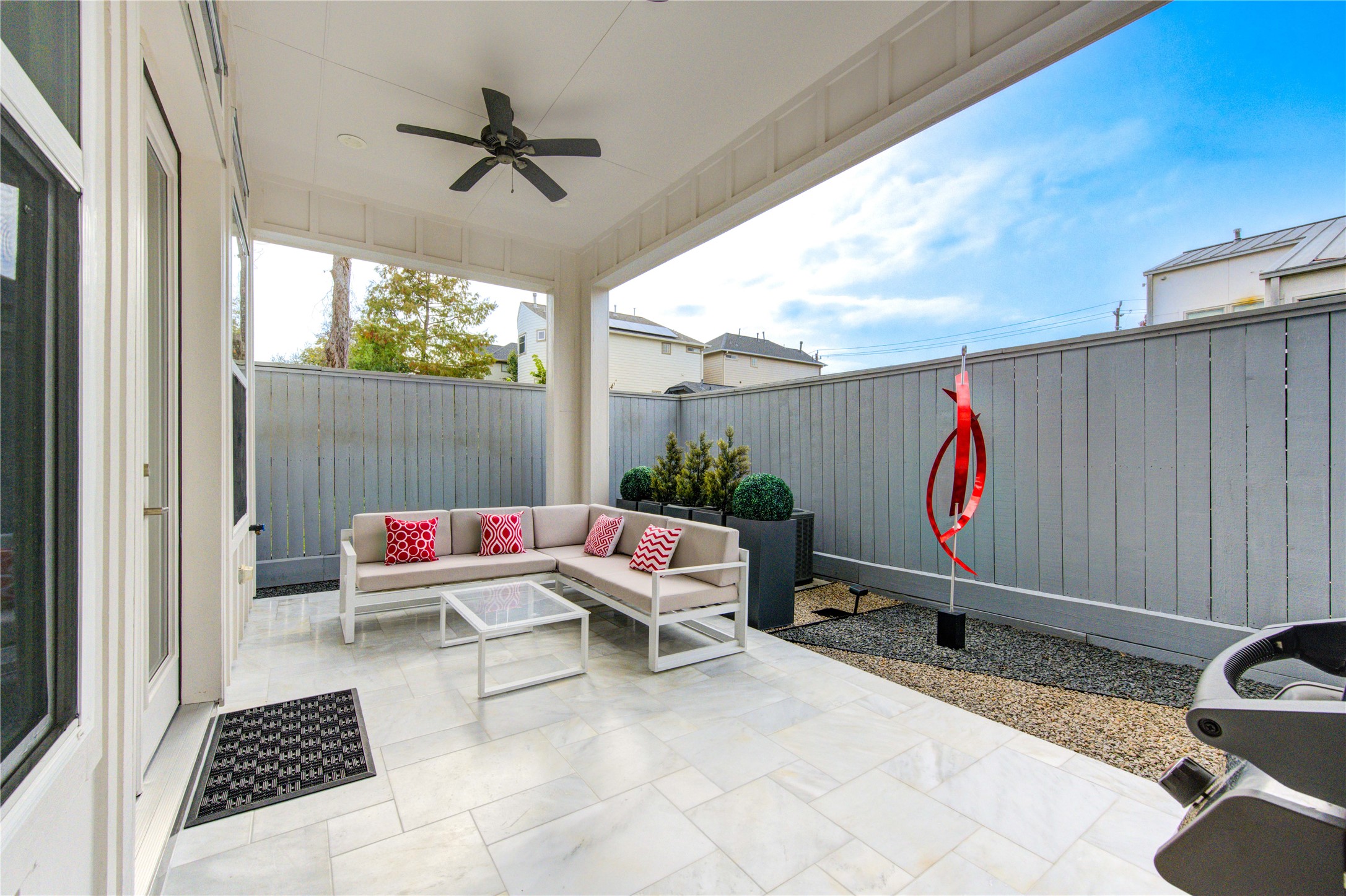 419 Malone Street Houston, TX 77007 - Photo 16 of 47 Elegant patio/deck showcasing marble flooring and stylish planters, adding charm and sophistication to the outdoor space