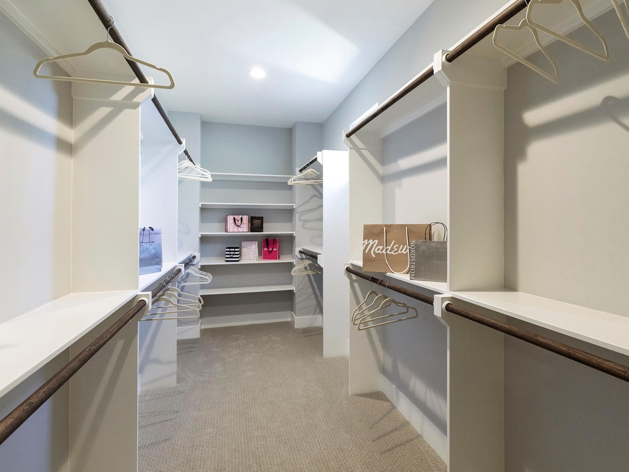 419 Malone Street Houston, TX 77007 - Photo 30 of 47 The walk-in closet is custom-built and conveniently located within the primary bedroom, offering built-in drawers, privacy, and effortless access.