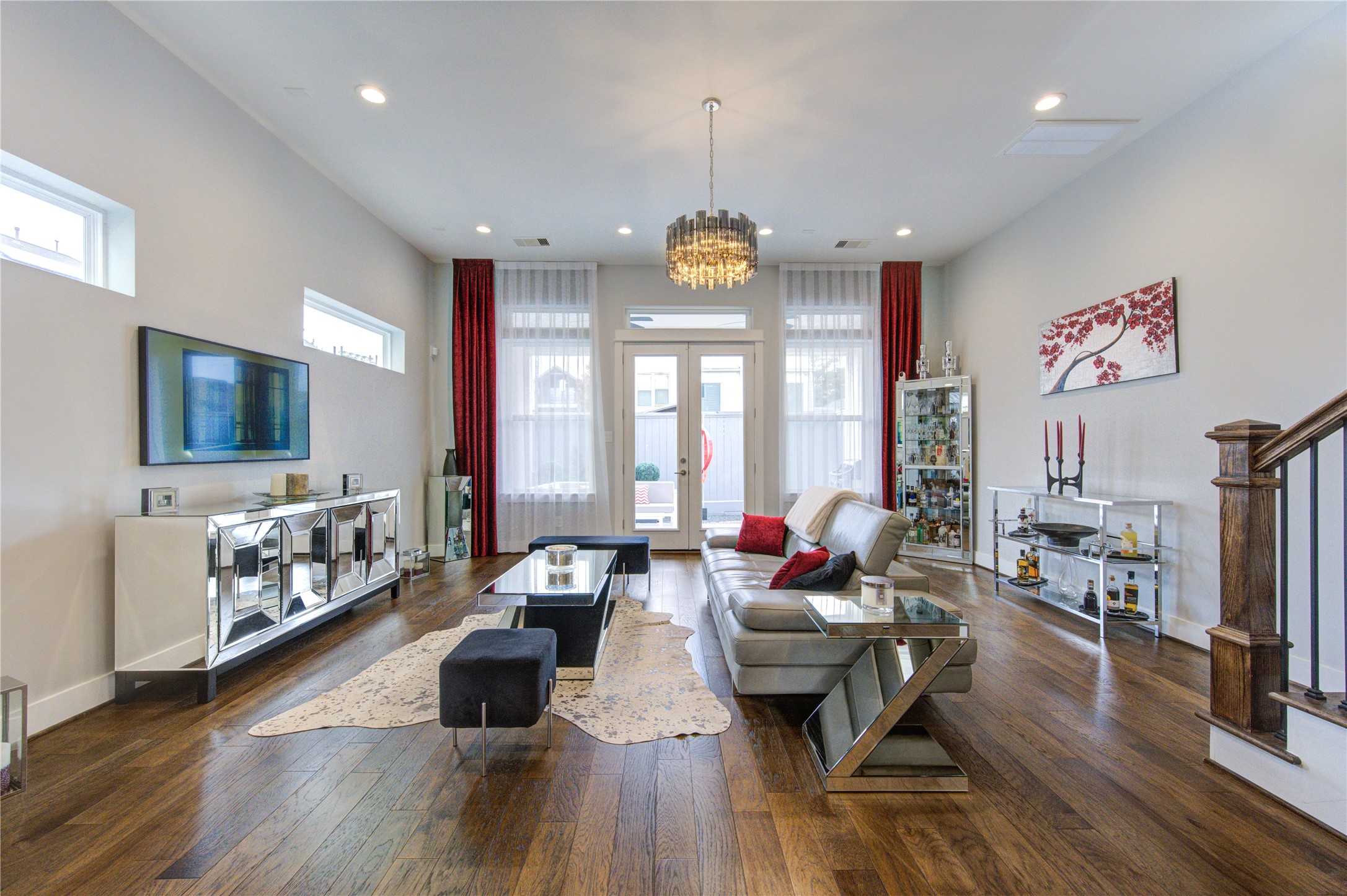 419 Malone Street Houston, TX 77007 - Photo 4 of 47 a living room with furniture flat screen tv and wooden floor