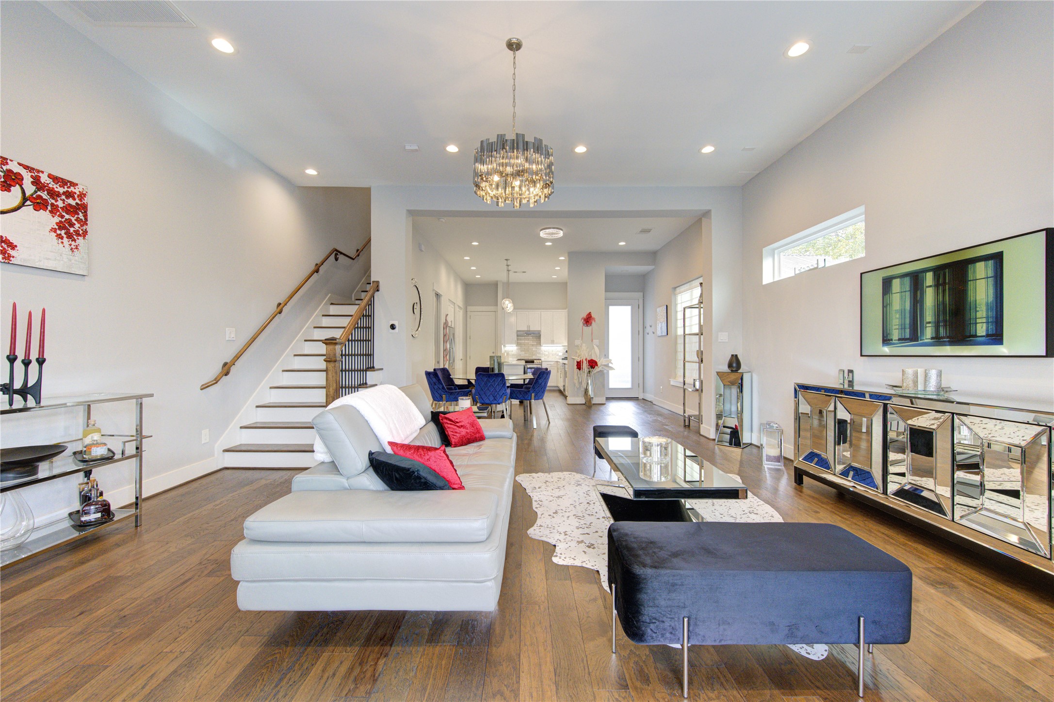 419 Malone Street Houston, TX 77007 - Photo 6 of 47 An elegant staircase from the living room provides access to the second floor.